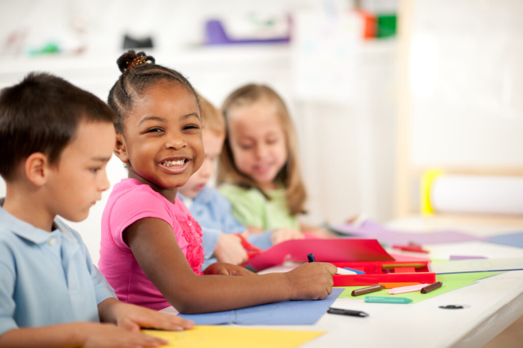 The State of Kansas mandates the entrance age of kindergarten for all state accredited schools.